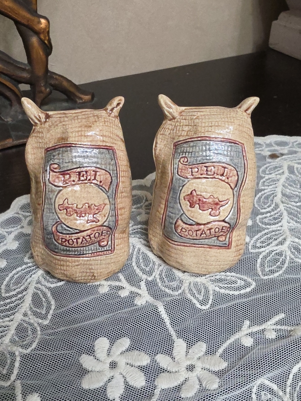 Ceramic Salt and Pepper Shakers - Potato Sack Design in Beige and Red